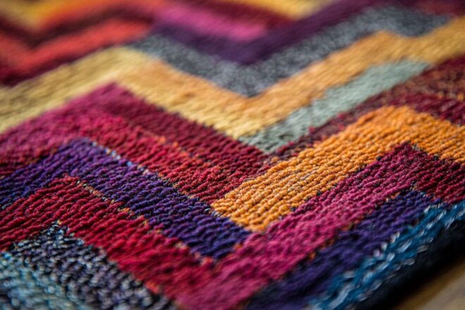 Gros plan d un paillasson texturé avec des motifs complexes